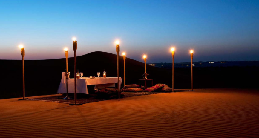 a table with candles in the desert