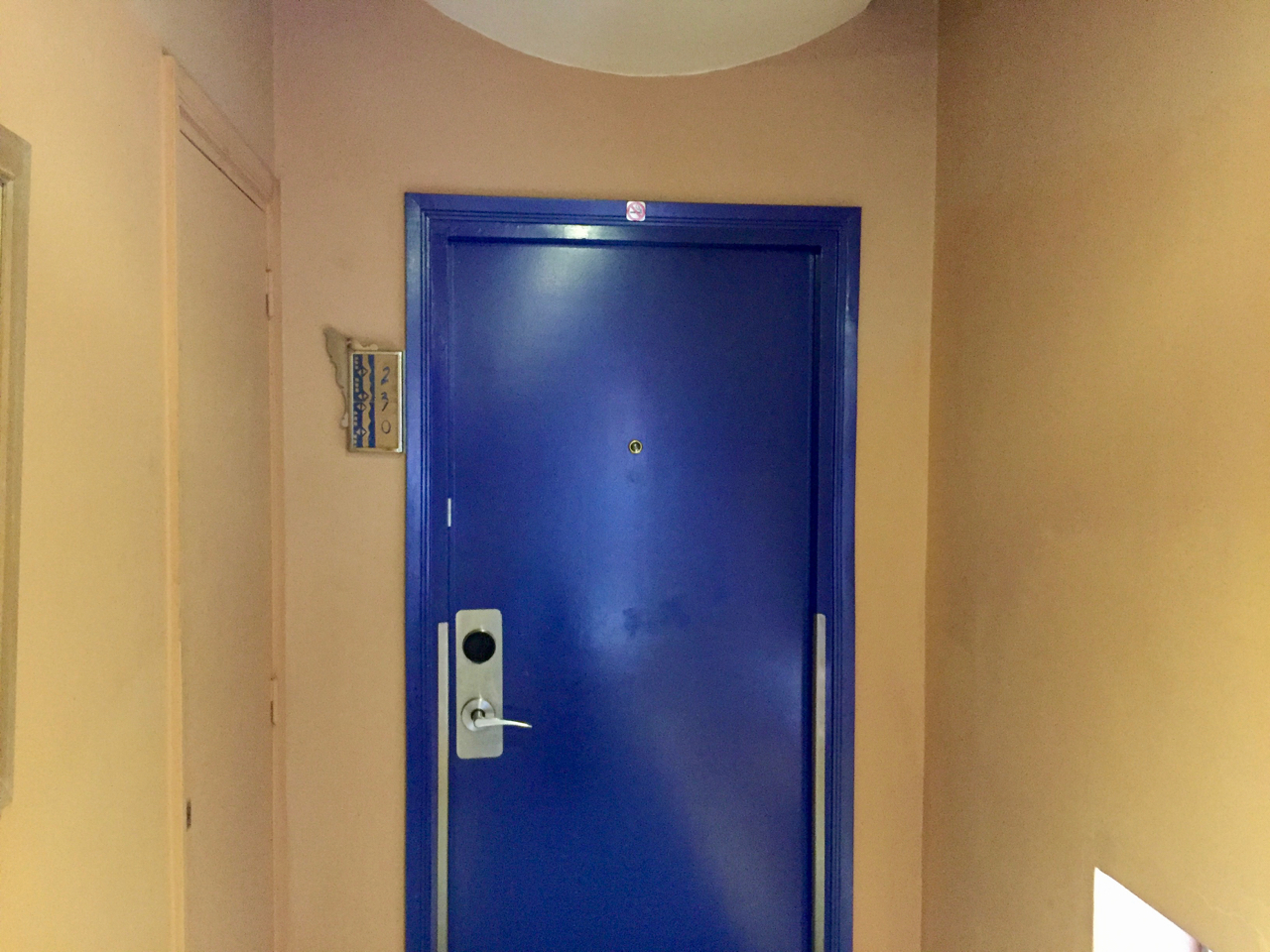 a blue door in a hallway