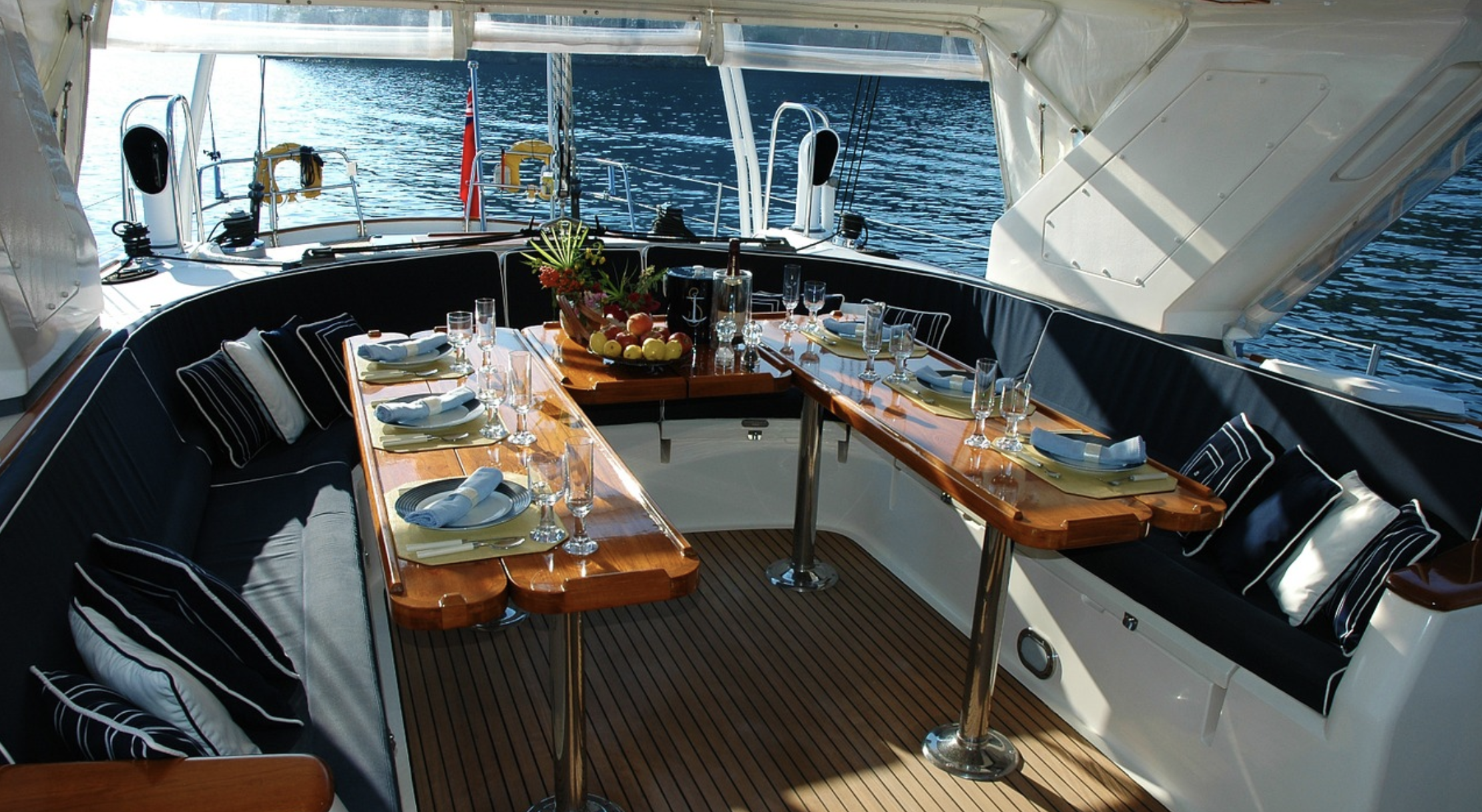a table set for dinner on a boat