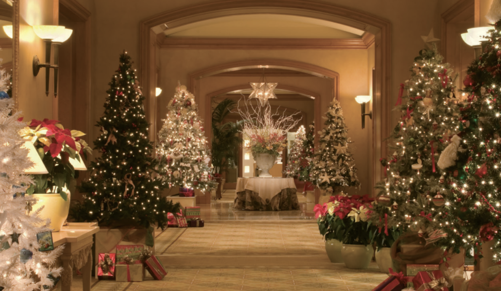 a hallway with christmas trees and presents